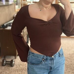 Brown long sleeve top with bell sleeves